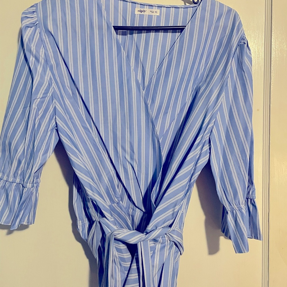 Striped peplum blouse with self tie belt.